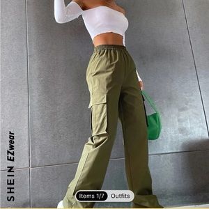 army green windbreaker style track pants